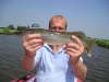 tim with small pike fish