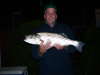 My dad with another fine striper fish
