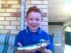 my son with a nice whiting fish